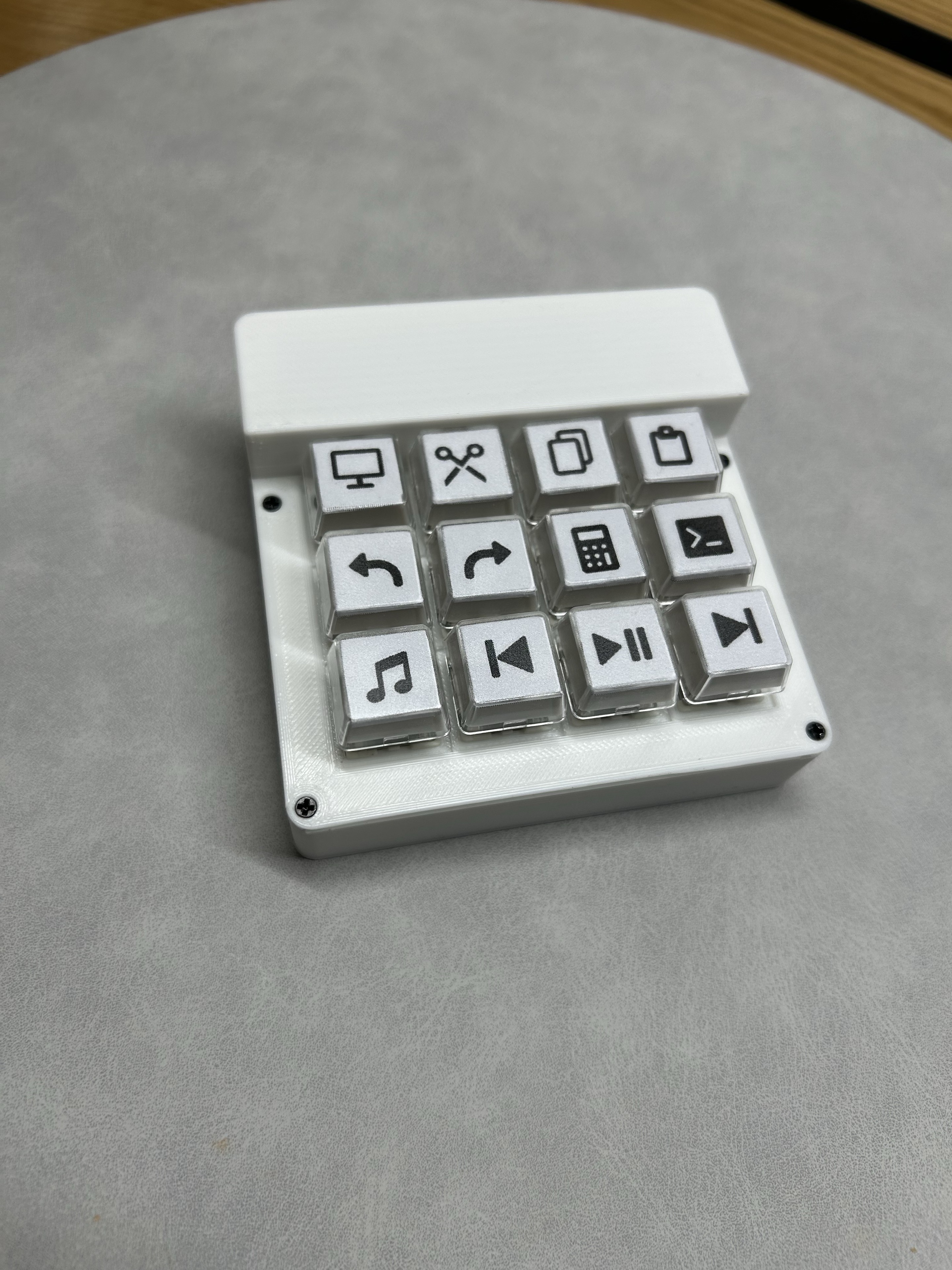 Closer front view of the current STACK prototype showing its twelve labelled keys.